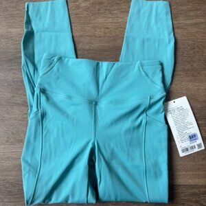 Fast and Free High-Rise Tight 25" 5 Pocket in Tidal Teal NWT